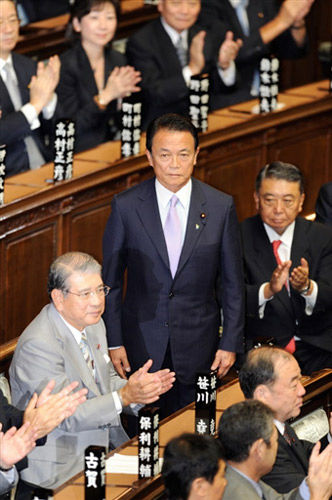 日本媒体称麻生太郎为访华推迟大选